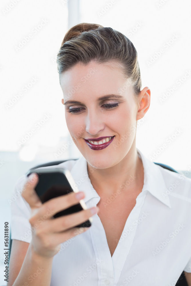 Close up view on smiling businesswoman using smartphone Close up view on smiling businesswoman using smartphone