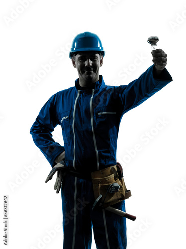 man electrician holding light bulb silhouette