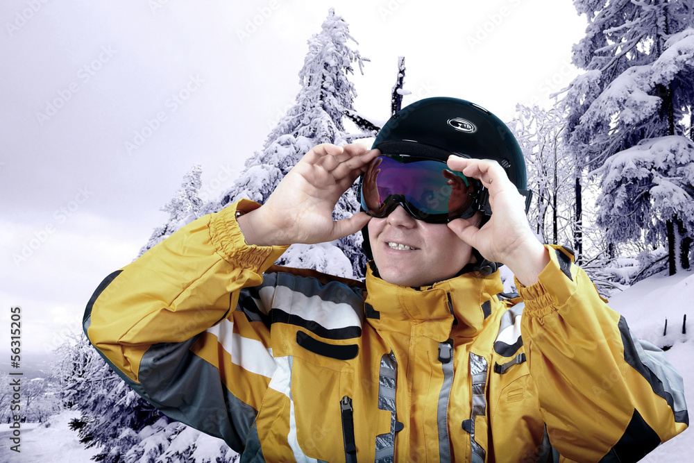 Portrait of man wearing a helmet and glasses on the background o Portrait of man wearing a helmet and glasses on the background o