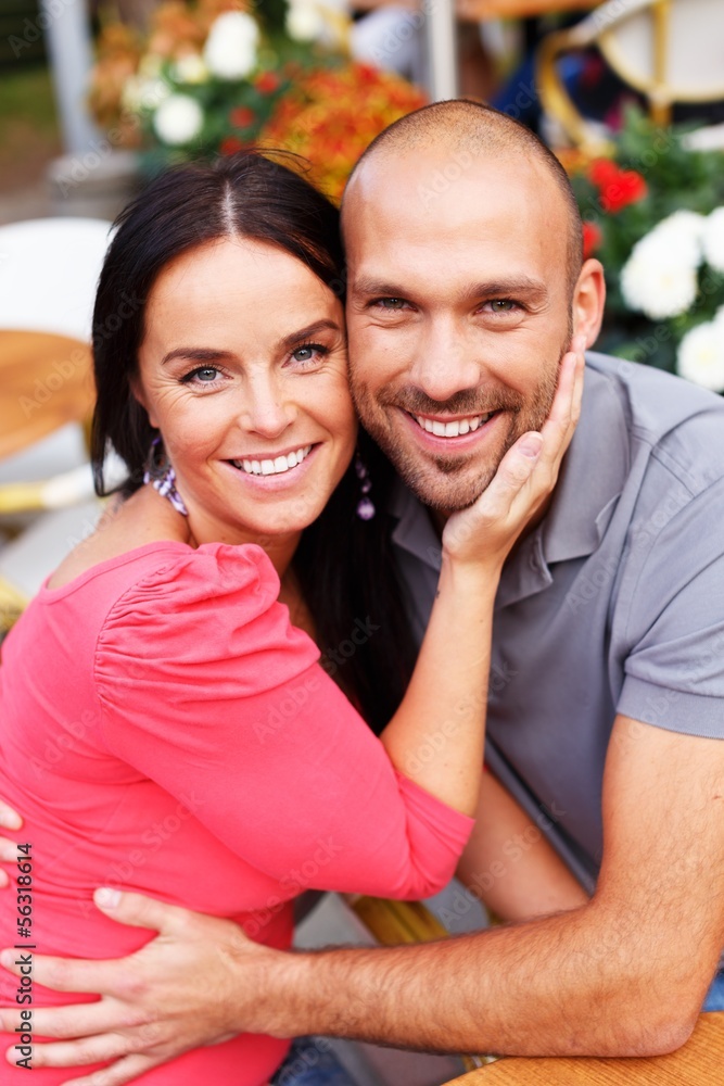 Fototapeta premium Happy smiling middle-aged couple outdoors