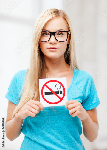 woman with smoking restriction sign photo