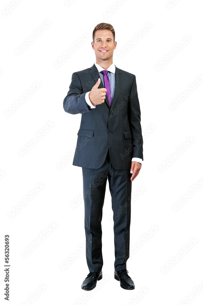 full length picture of a young business man showing thumb up and full length picture of a young business man showing thumb up and