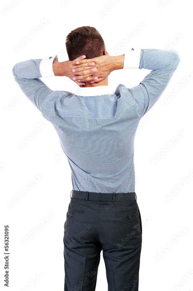 business man from the back - looking at something over a white b business man from the back - looking at something over a white b