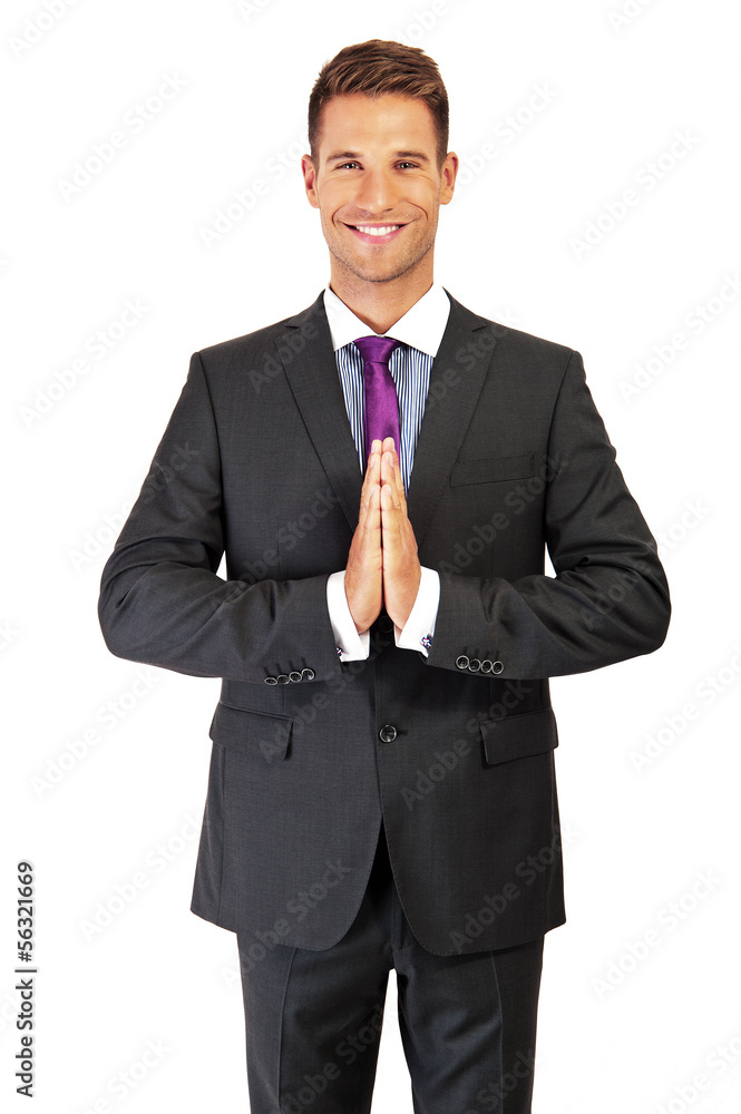 Confident young businessman with his hands clasped Confident young businessman with his hands clasped