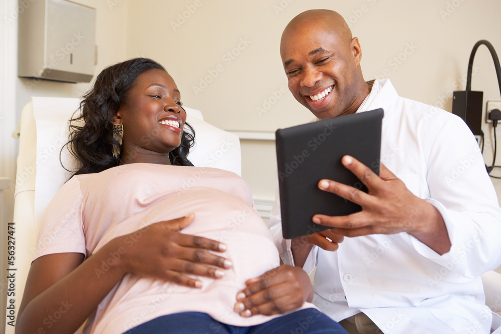 Pregnant Woman Being Given Ante Natal Check By Doctor Pregnant Woman Being Given Ante Natal Check By Doctor