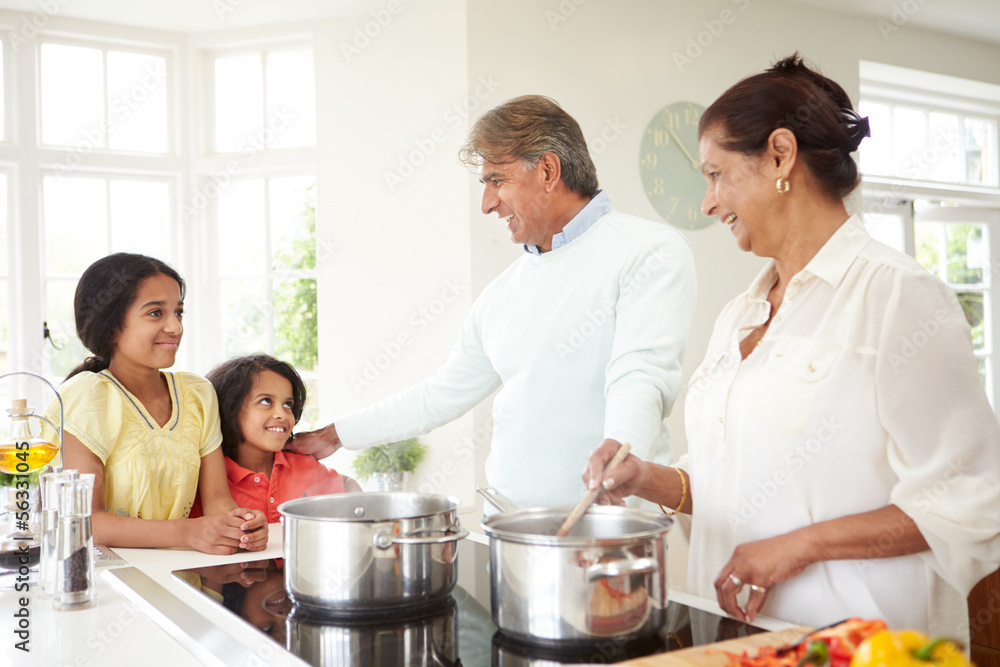 Grandparents And Grandchildren Cooking Meal At Home Grandparents And Grandchildren Cooking Meal At Home