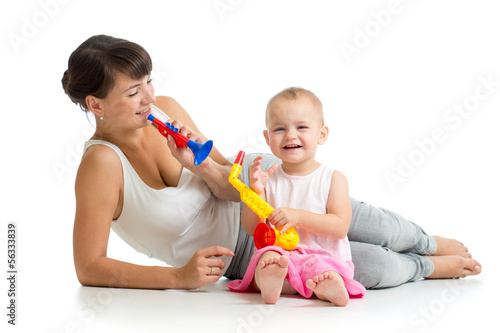 Mother and baby girl having...
