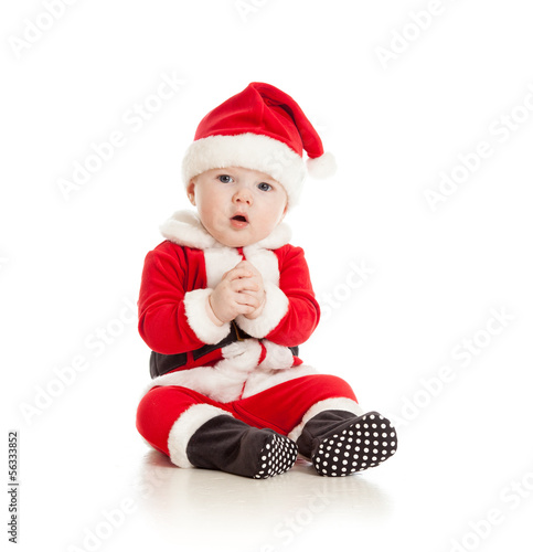 funny baby in Santa Claus c...