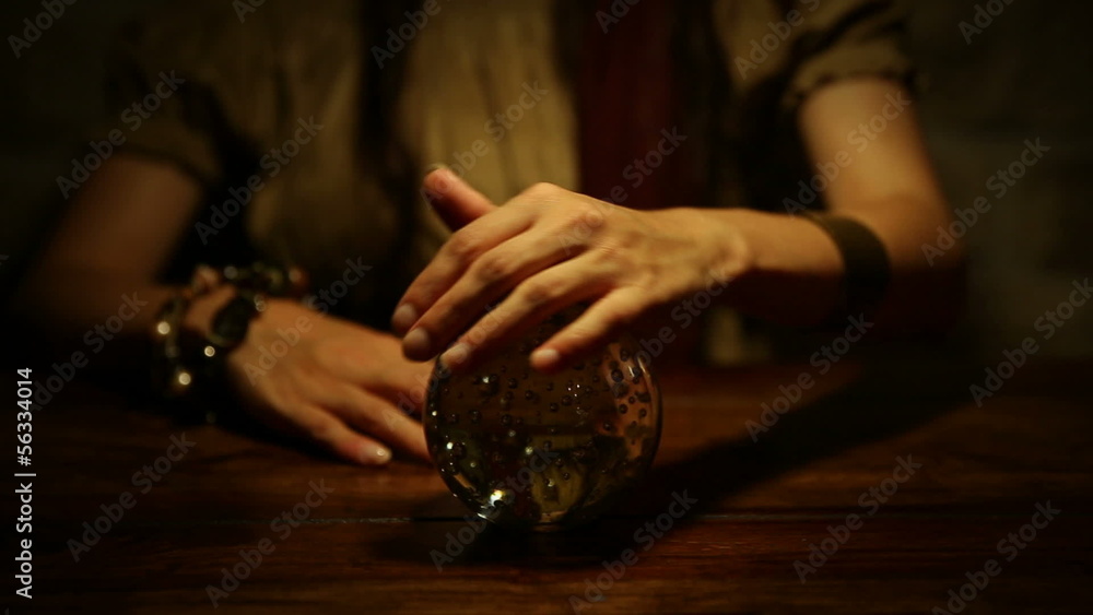 female fortune teller looks in the future and lifts thumb down female fortune teller looks in the future and lifts thumb down