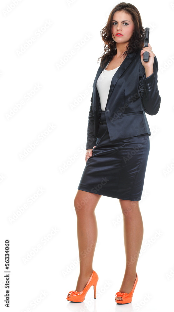 Fototapeta premium Young brunette woman with gun isolated on white