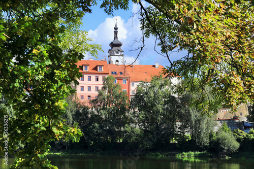 Medieval Castle in Town Pisek with the deanery Church, Czechia photo