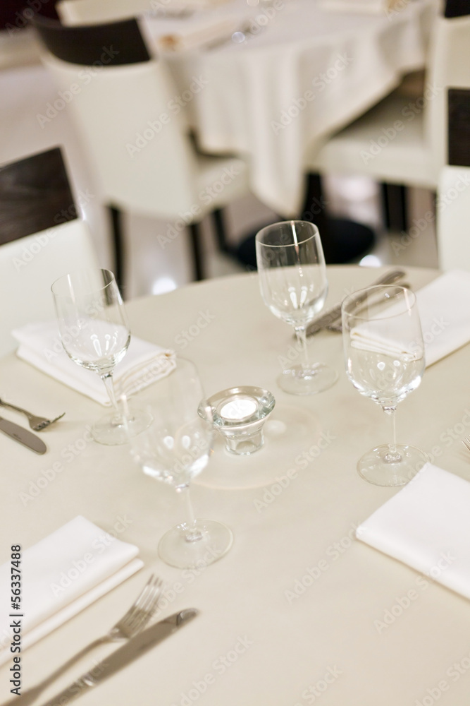 Tables set for meal Tables set for meal