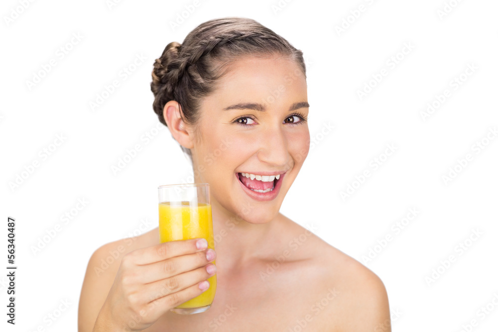 Smiling healthy model holding orange juice Smiling healthy model holding orange juice