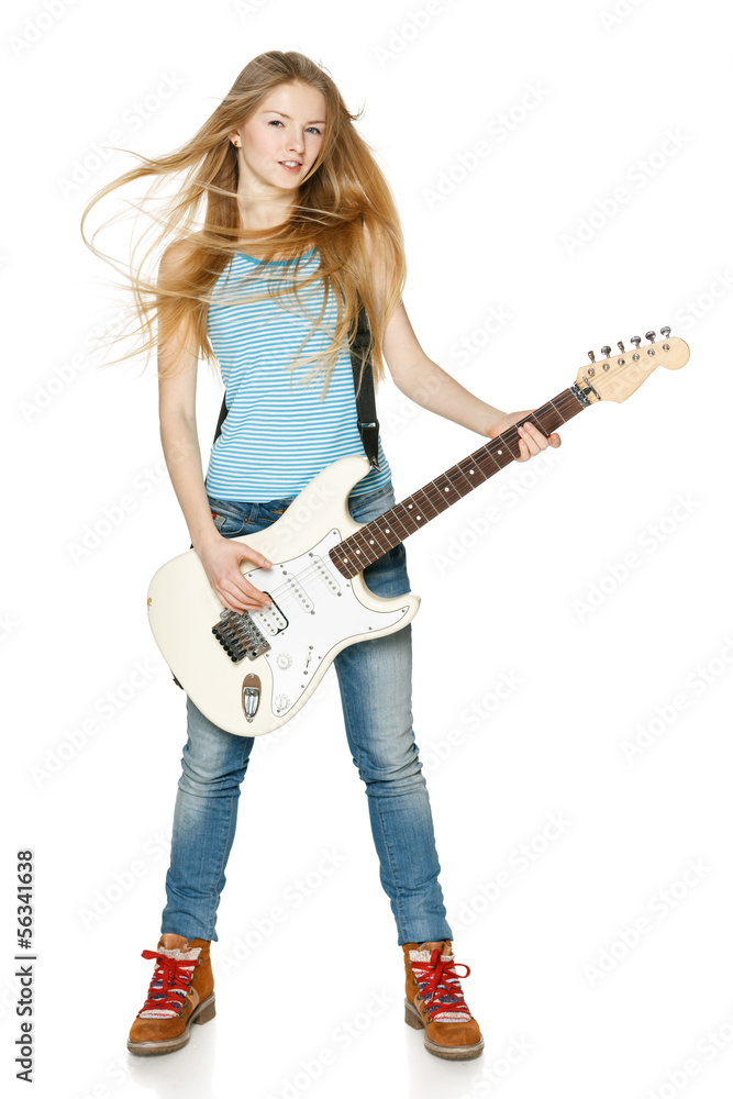 Pretty blond woman playing the guitar in full length Pretty blond woman playing the guitar in full length