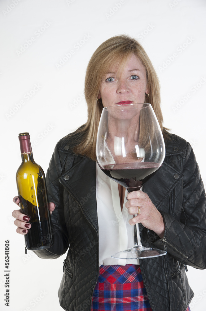 Woman with a very large glass of red wine Woman with a very large glass of red wine