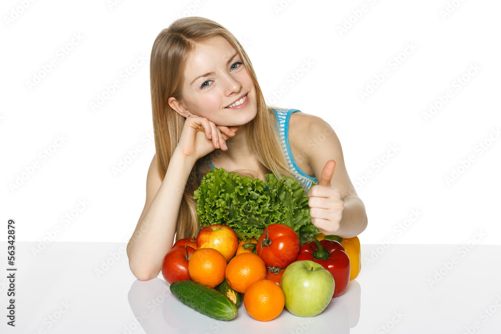Girl with vegetables and fruits showing thumb up Girl with vegetables and fruits showing thumb up