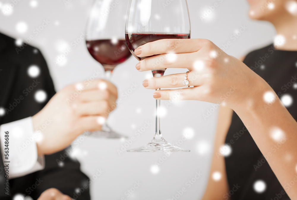engaged couple with wine glasses engaged couple with wine glasses