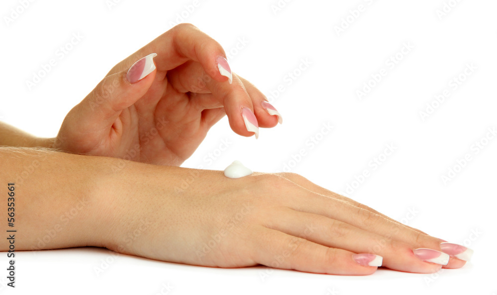 Beautiful woman hands with cream, isolated on white Beautiful woman hands with cream, isolated on white