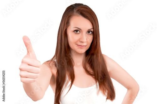 Young attractive brunette woman showing thumbs up