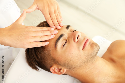 Man having head massage close up