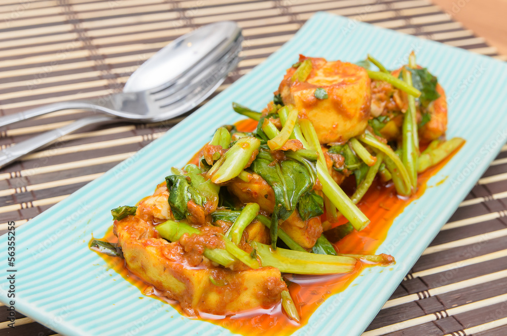 Fried Tofu with chinese kale in red curry saurce Fried Tofu with chinese kale in red curry saurce