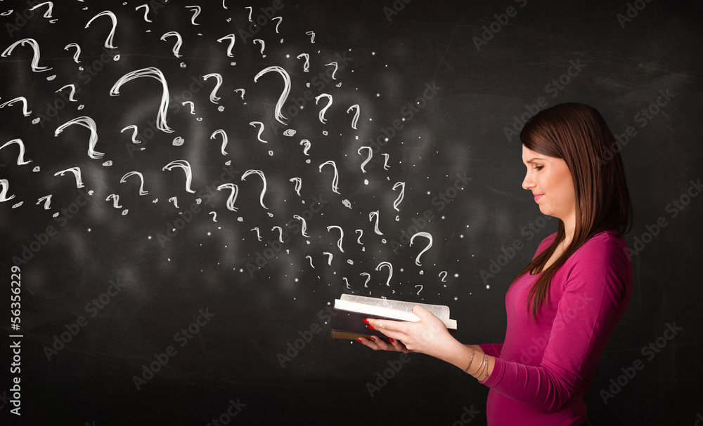 Pretty woman reading a book with question marks coming out from Pretty woman reading a book with question marks coming out from