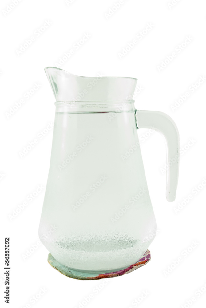 jug of water or glass carafe with coaster on white background jug of water or glass carafe with coaster on white background