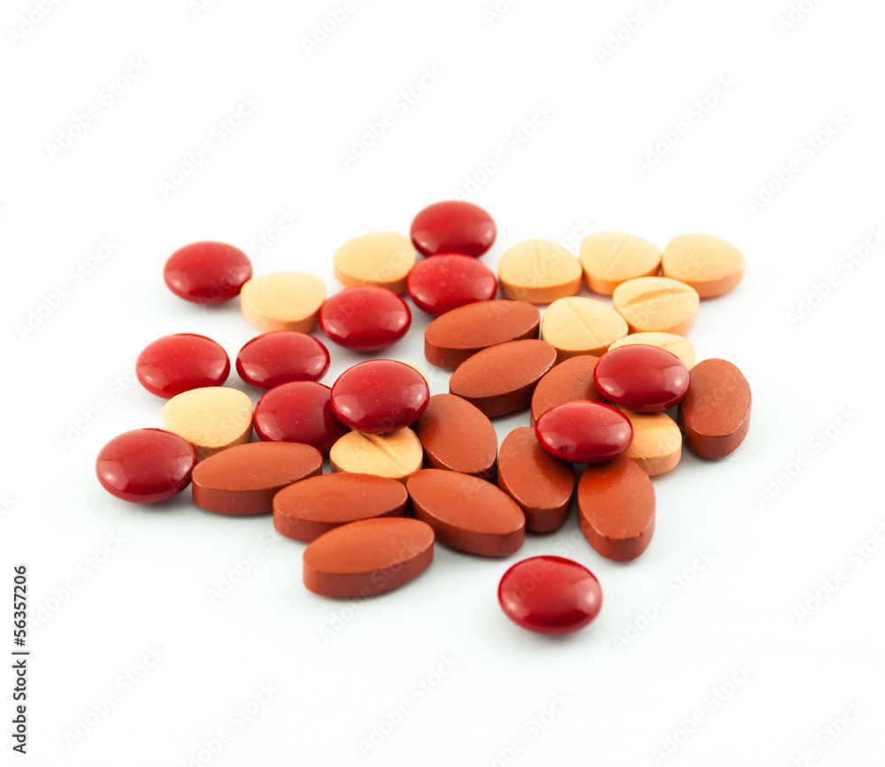 An assortment of pills, tablets isolated on white background An assortment of pills, tablets isolated on white background