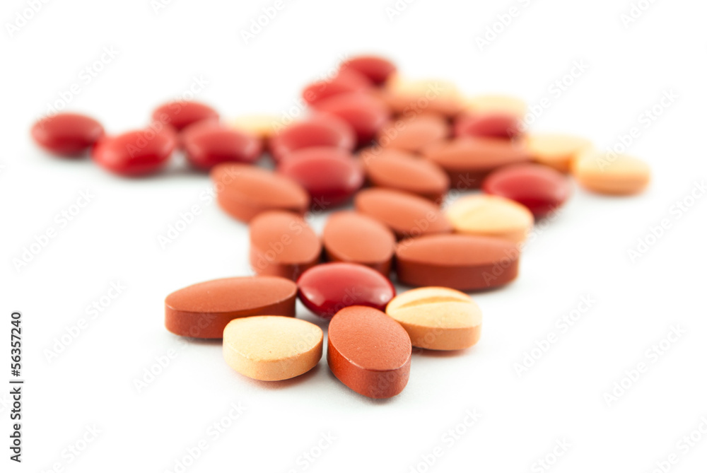 An assortment of pills, tablets isolated on white background An assortment of pills, tablets isolated on white background