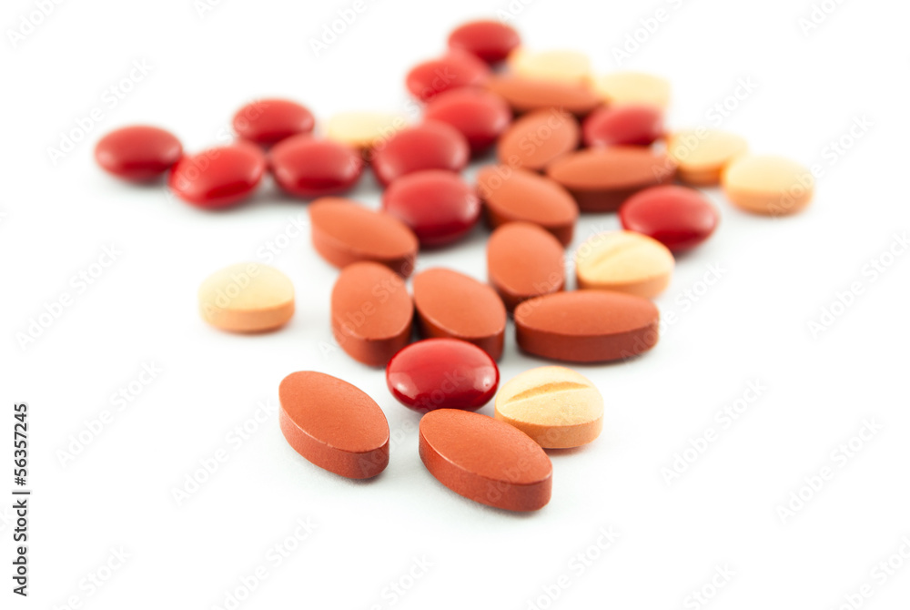 An assortment of pills, tablets isolated on white background An assortment of pills, tablets isolated on white background