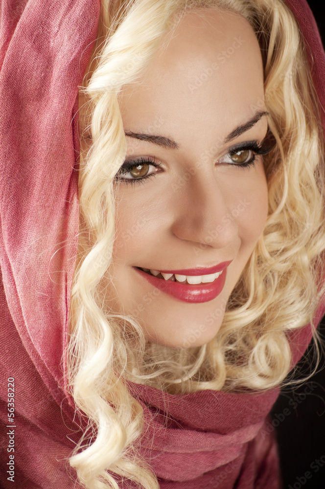 Fototapeta premium Pretty girl with curly blond hair