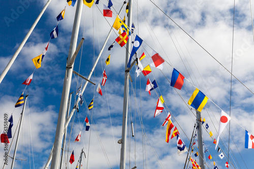 Colourful signal flags on a sailing boat