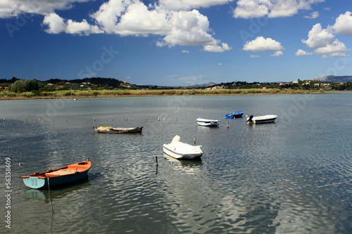 Small Fishing boats moored in bay