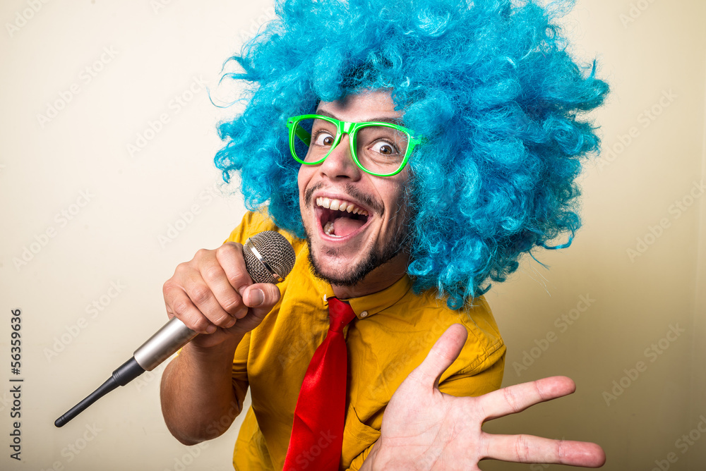 Fototapeta premium crazy funny young man with blue wig