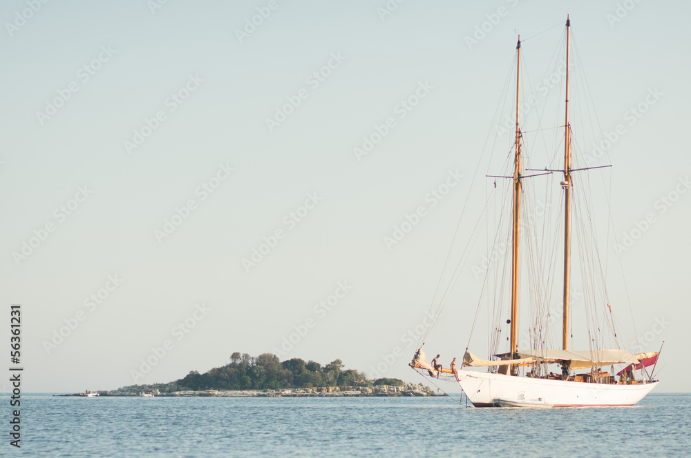 old sailing ship and island