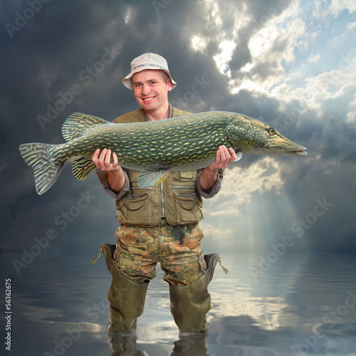 The fisherman with big fish (The Northern Pike - Esox lucius).