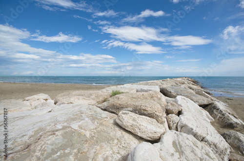 walk on the rocks from the beach to the sea