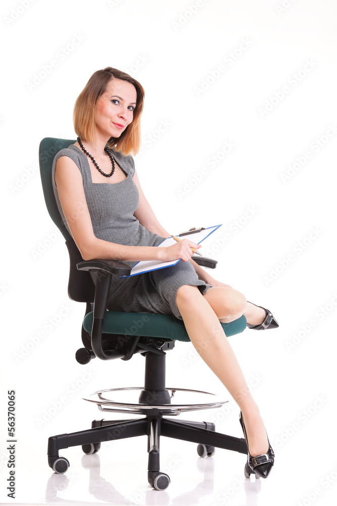 young business woman sitting with her clipboard isolated young business woman sitting with her clipboard isolated