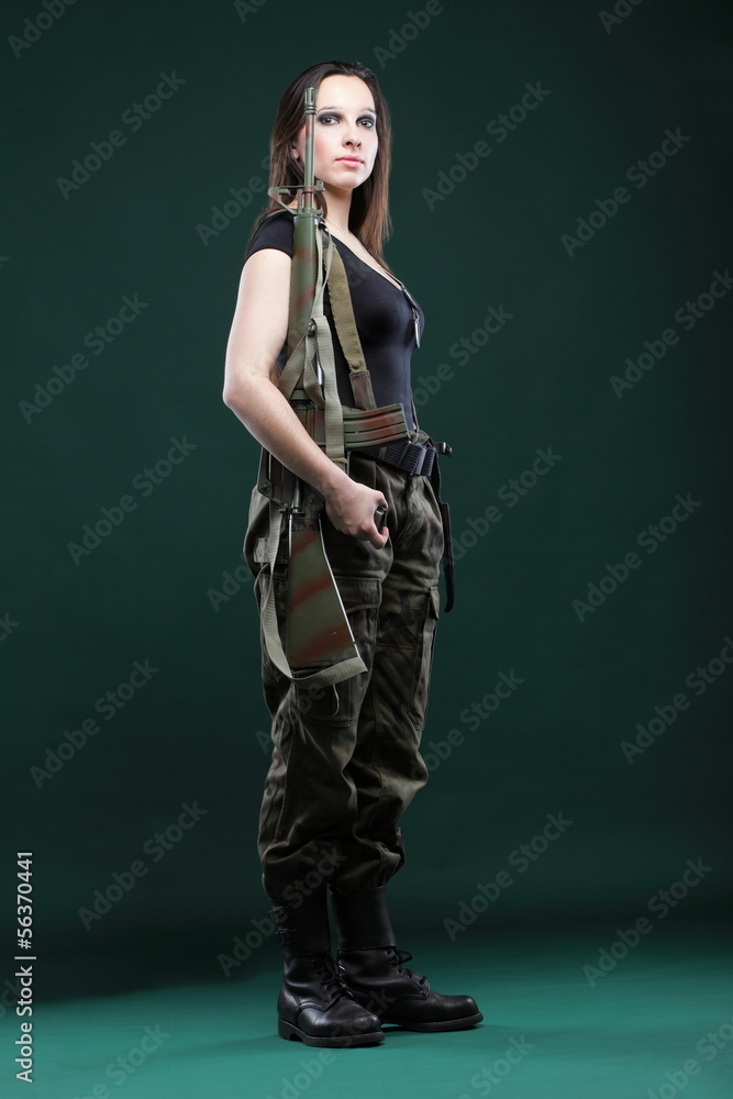 Fototapeta premium Army Woman With Gun - Beautiful woman with rifle plastic