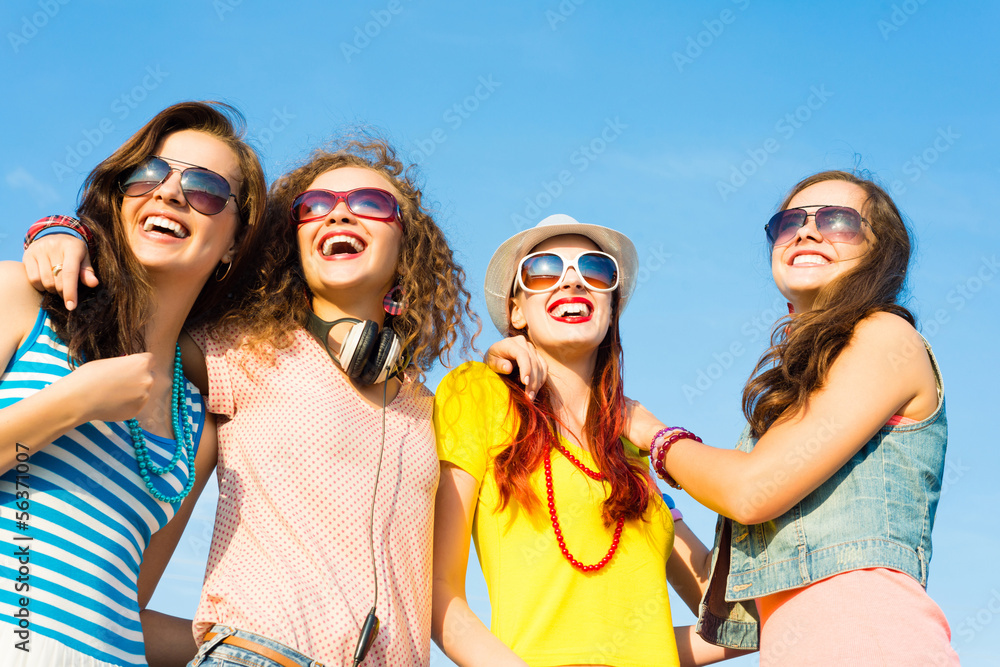 group of young people wearing sunglasses and hat group of young people wearing sunglasses and hat