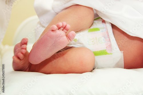 little foots of newborn baby