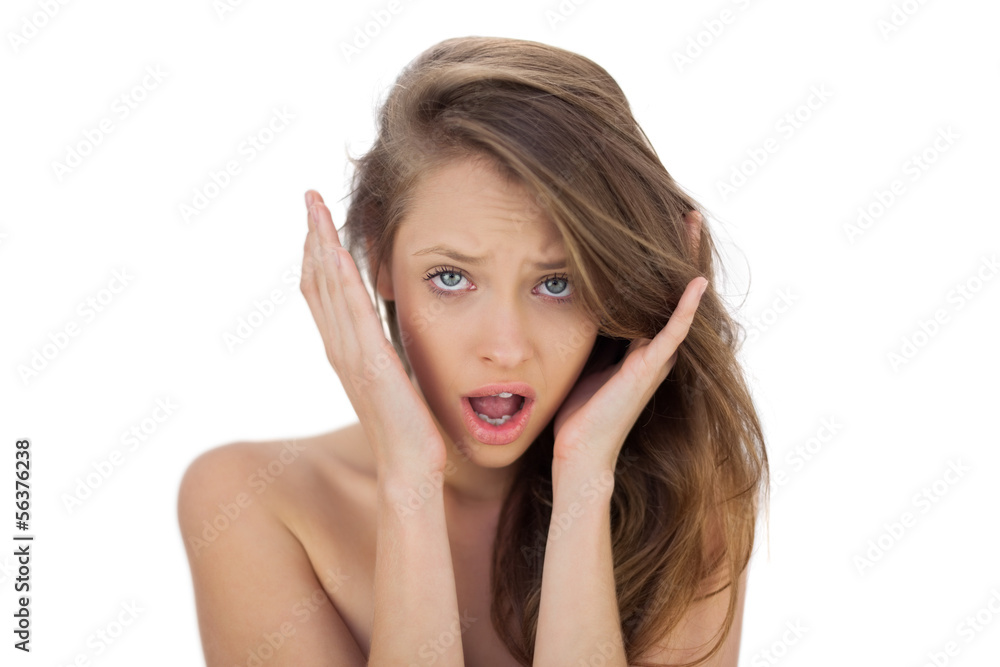 Irritated brunette model screaming looking at camera Irritated brunette model screaming looking at camera