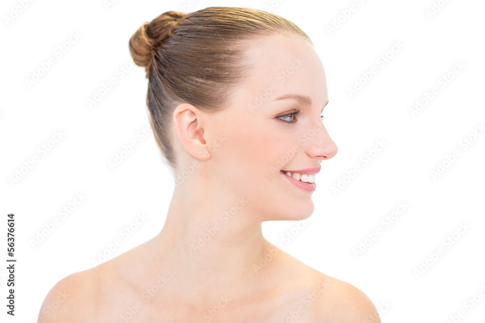 Profile view of a smiling pretty blonde model Profile view of a smiling pretty blonde model