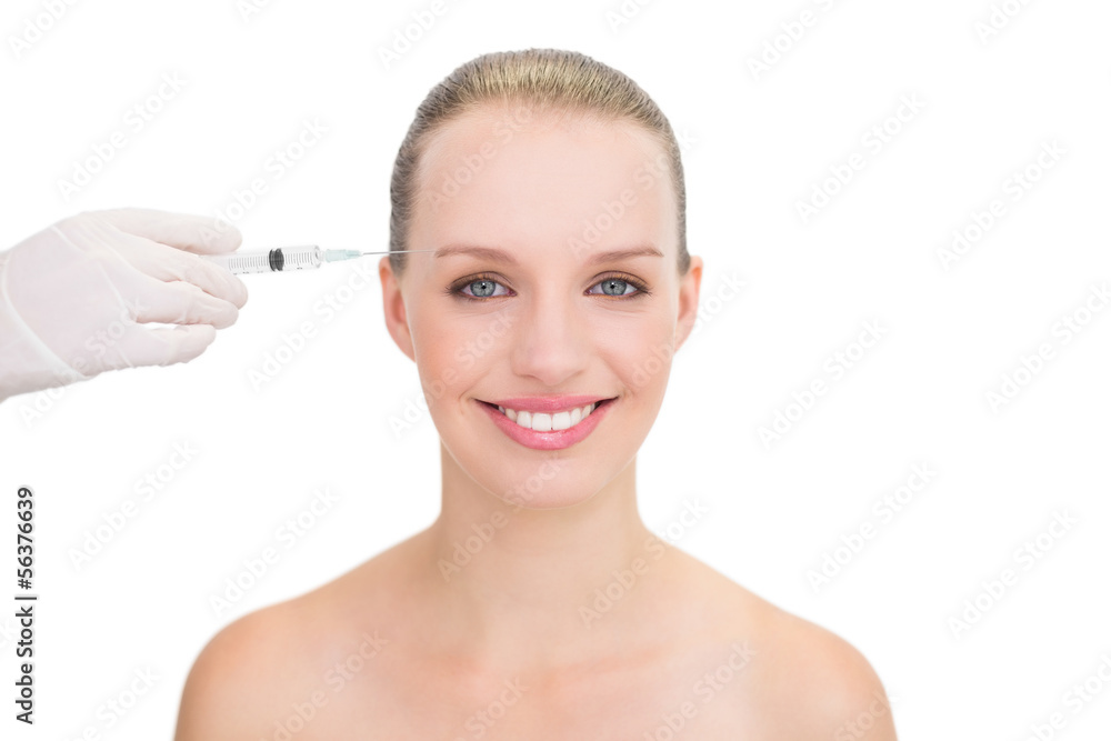 Happy pretty blonde model receiving botox injection Happy pretty blonde model receiving botox injection