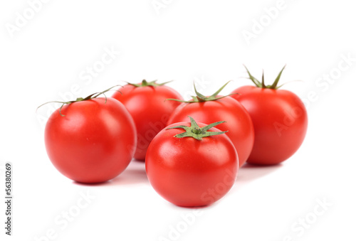 Five red ripe tomatoes