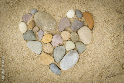 Pebbles arranged in a heart shape