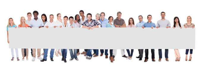 Group of business people with a blank banner