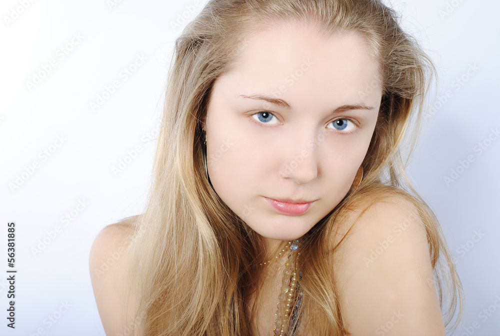 Portrait of the beautiful girl in costume jewellery Portrait of the beautiful girl in costume jewellery