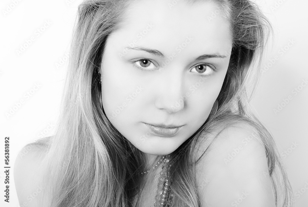 Naklejka premium Portrait of the beautiful girl in costume jewellery