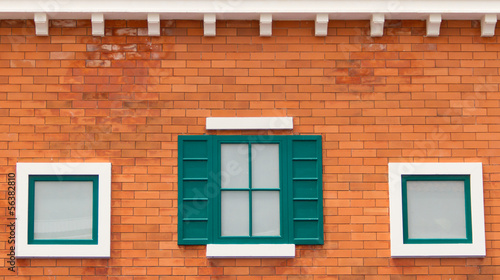 White window on a brick wall